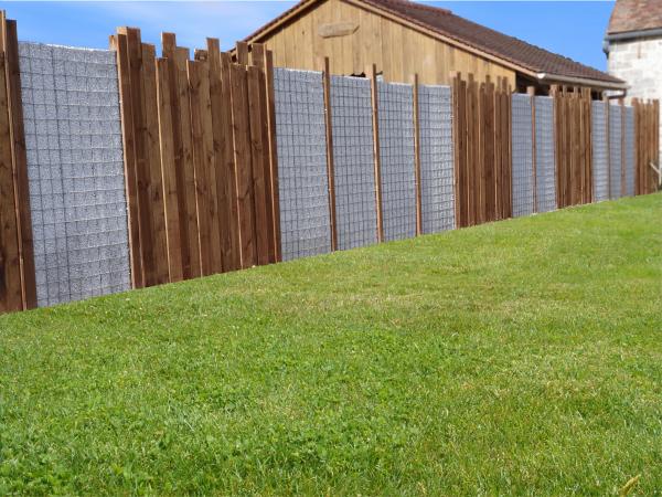 Réalisation d'une clôture avec panneaux bois et gabions